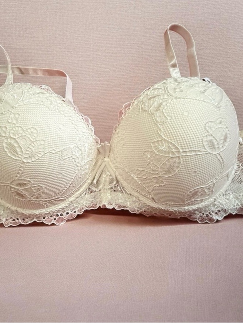 White extreme push-up bra made of nylon, size 34C.
